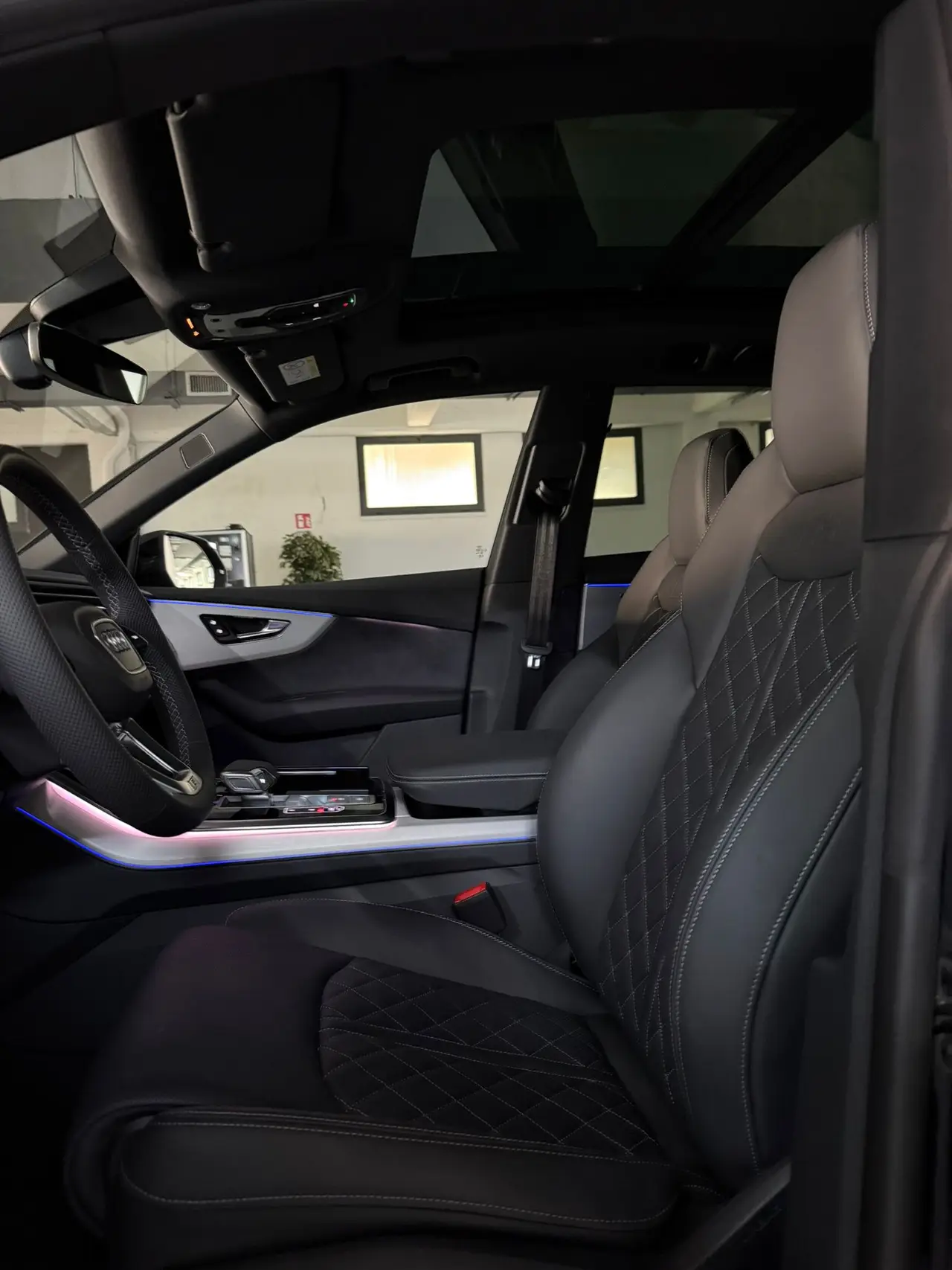 Audi Q8 2025, rear view — Milan Luxury Cars, Milan. The 2025 Audi Q8 pairs a 340 hp drivetrain with a five-seat cabin that stays composed on…
