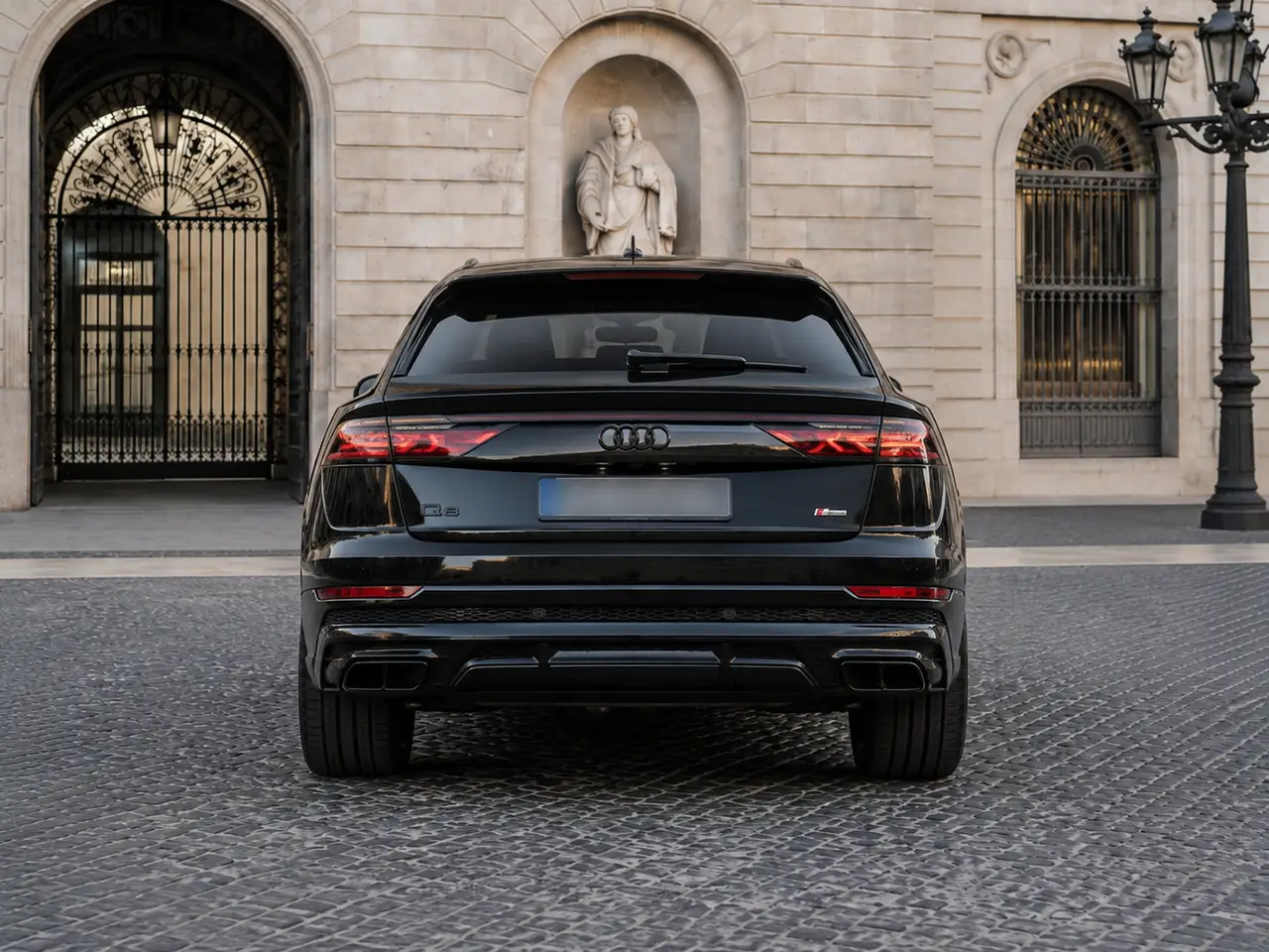Audi Q8 2025, rear view — Milan Luxury Cars, Milan. The 2025 Audi Q8 pairs a 340 hp drivetrain with a five-seat cabin that stays composed on…