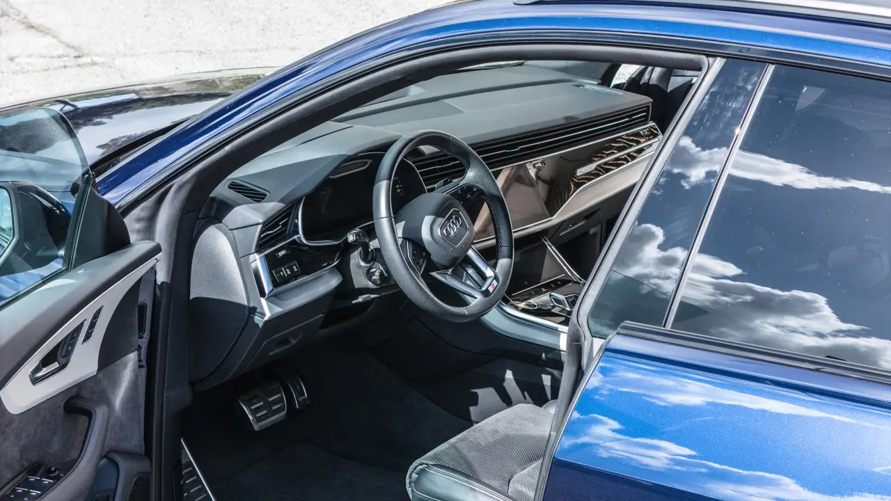 Audi Q8 55 TFSI 2022, interior — Milan Luxury Cars, Milan. The 2022 Audi Q8 55 TFSI pairs 340 hp with a cabin built for five, making it a practical…