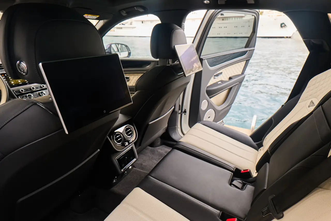 Bentley Bentayga V8-S 2024, interior — Milan Luxury Cars, Milan. The 2024 Bentley Bentayga V8-S pairs a 550 hp V8 with the full-size presence of Bentley's…