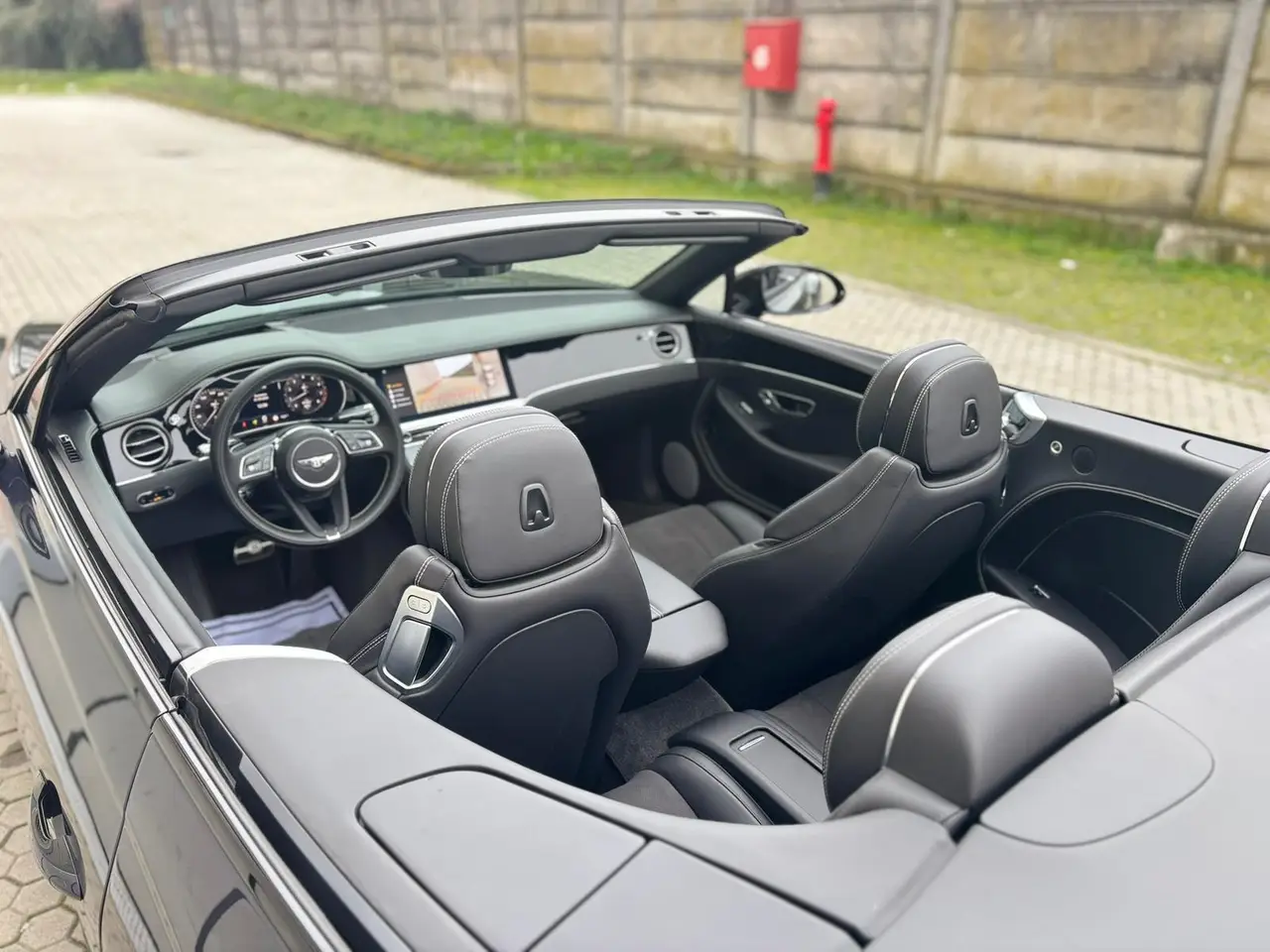 Bentley Continental GTC S V8 2025, side profile — Milan Luxury Cars, Milan. The 2025 Bentley Continental GTC S V8 pairs a 550 hp engine with a four-seat cabin,…