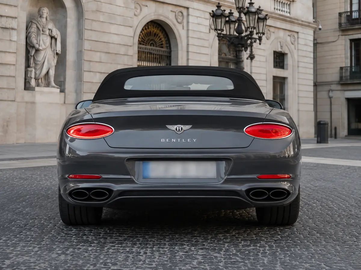 Bentley Continental GTC S V8 2025, rear view — Milan Luxury Cars, Milan. The 2025 Bentley Continental GTC S V8 pairs a 550 hp engine with a four-seat cabin,…