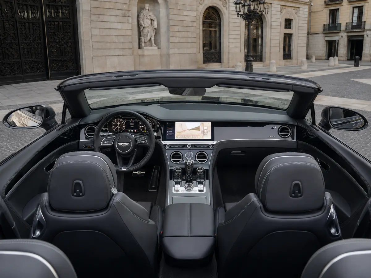Bentley Continental GTC S V8 2025, interior — Milan Luxury Cars, Milan. The 2025 Bentley Continental GTC S V8 pairs a 550 hp engine with a four-seat cabin,…