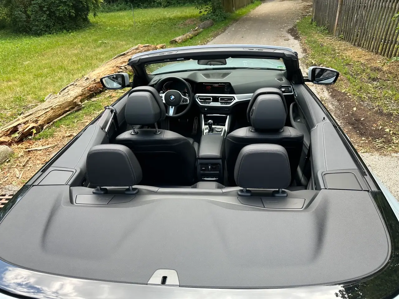 BMW 430i Cabrio 2023, rear view — Milan Luxury Cars, Milan. The 2023 BMW 430i Cabrio pairs 245 hp with a folding roof and four seats, making it a…