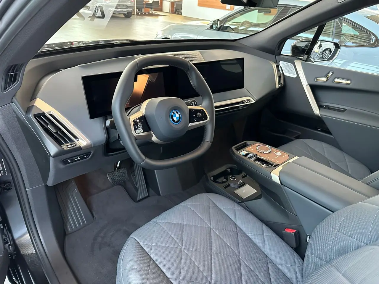 BMW IX M60 2023, exterior — Milan Luxury Cars, Milan. The BMW iX M60 brings 619 hp to a five-seat SUV body without the theatre of a combustion…