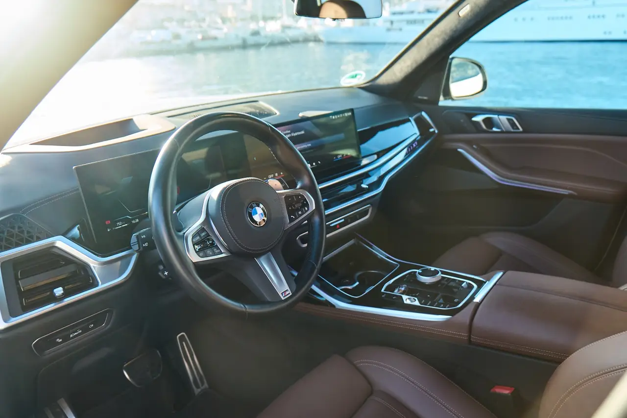 BMW X7 40d M 2024, interior — Milan Luxury Cars, Milan. The 2024 BMW X7 40d M brings seven-seat capacity and 352 hp to a segment where most…