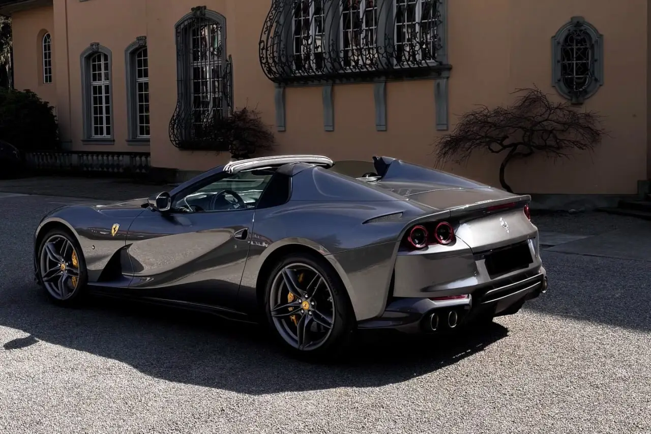 Ferrari 812 GTS 2024, front view — Milan Luxury Cars, Milan. The Ferrari 812 GTS pairs a naturally aspirated V12 producing 800 hp with an open-top…