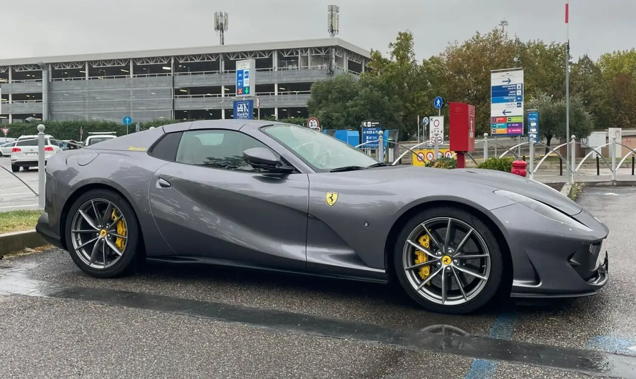 Ferrari 812 GTS 2024, rear view — Milan Luxury Cars, Milan. The Ferrari 812 GTS pairs a naturally aspirated V12 producing 800 hp with an open-top…