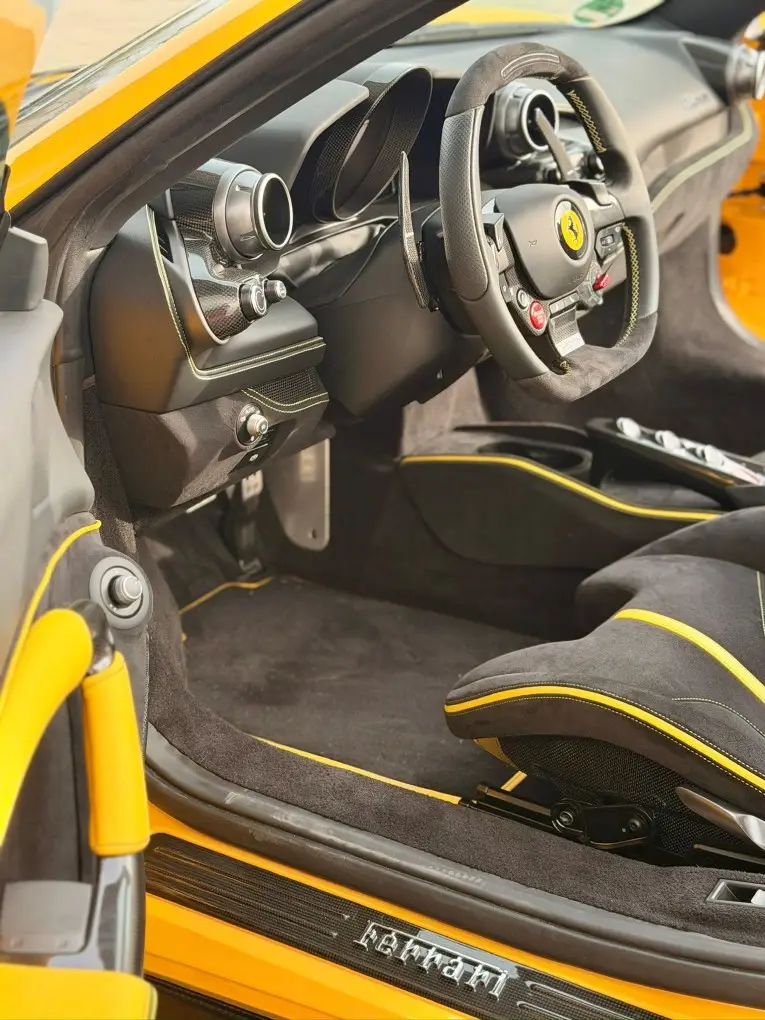 Ferrari F8 SPIDER 2023, interior — Milan Luxury Cars, Milan. The Ferrari F8 Spider pairs a 720 hp V8 with an open roof, a combination that rewards a…