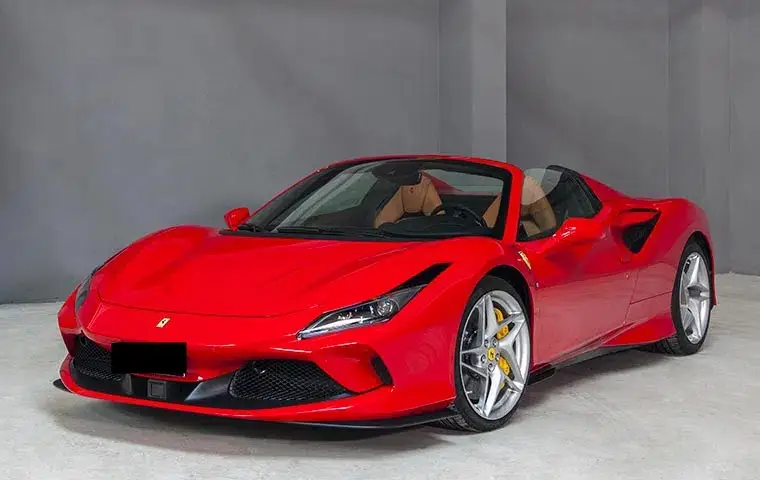 Ferrari F8 Tributo Spider Red 2023, front view — Milan Luxury Cars, Milan. The Ferrari F8 Tributo Spider pairs a 720 hp V8 with a retractable hardtop, giving two…