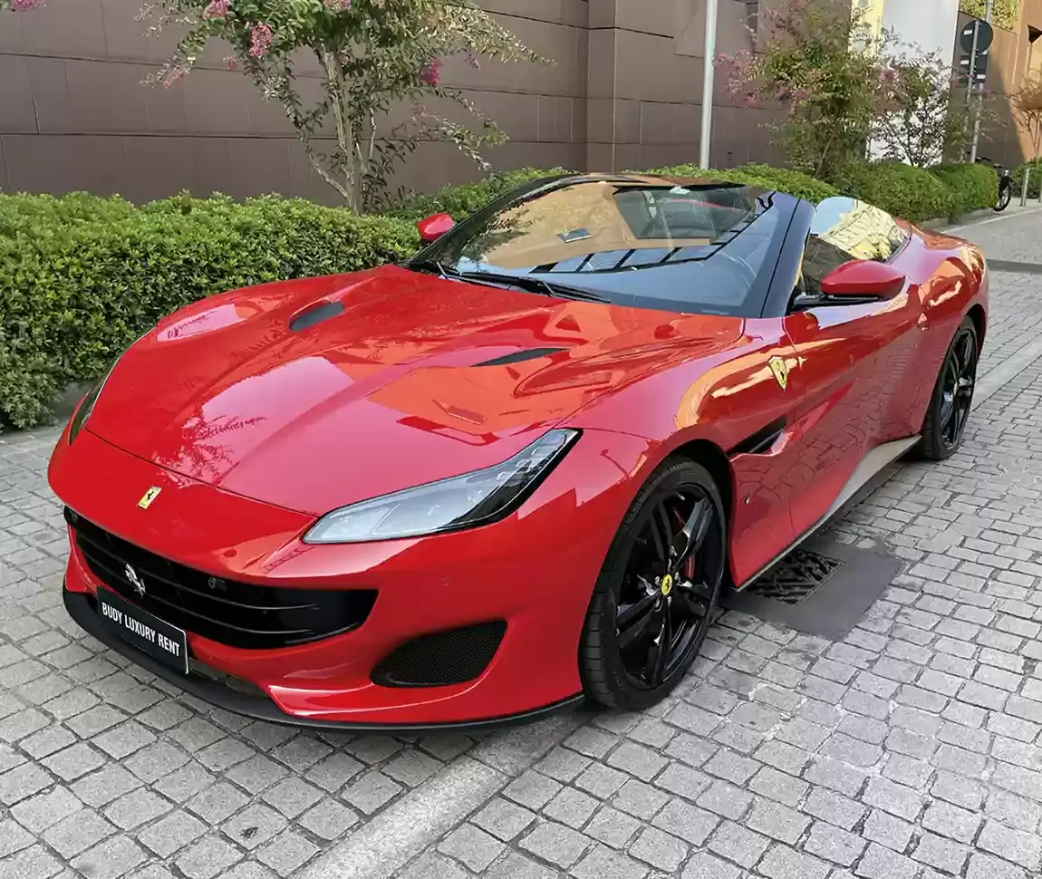 Ferrari Portofino M 2023, rear view — Milan Luxury Cars, Milan. The Ferrari Portofino M pairs a 620 hp V8 with a retractable hard top, giving it a dual…