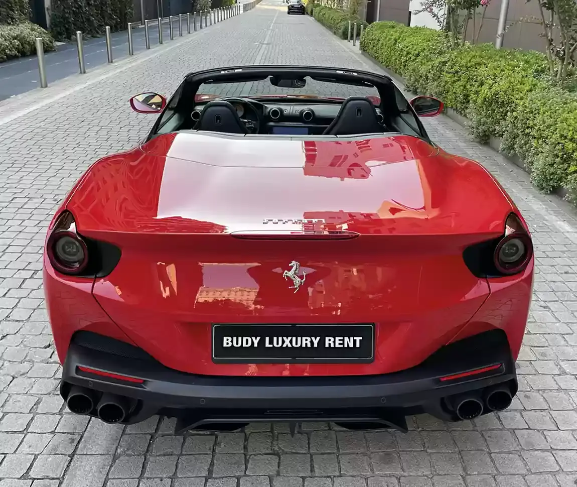 Ferrari Portofino M 2023, side profile — Milan Luxury Cars, Milan. The Ferrari Portofino M pairs a 620 hp V8 with a retractable hard top, giving it a dual…