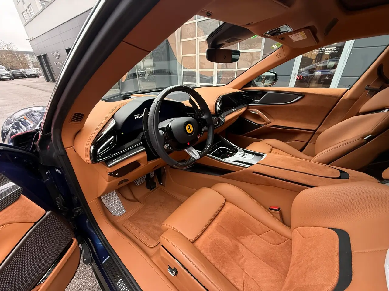 Ferrari Purosangue 2024, rear view — Milan Luxury Cars, Milan. The Ferrari Purosangue occupies an unusual position in the Ferrari range: five seats, 715…