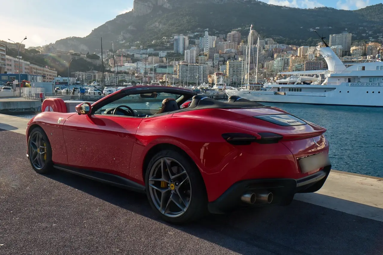 Ferrari Roma Spider 2024, front view — Milan Luxury Cars, Milan. The Ferrari Roma Spider pairs a 620 hp V8 with a design language closer to a grand tourer…