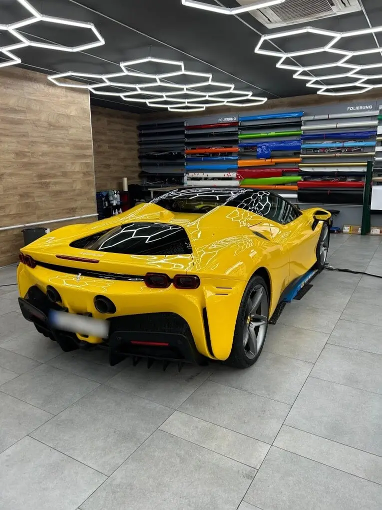 Ferrari SF90 Spider 2024, rear view — Milan Luxury Cars, Milan. The 2024 Ferrari SF90 Spider combines a twin-turbo V8 with three electric motors to…