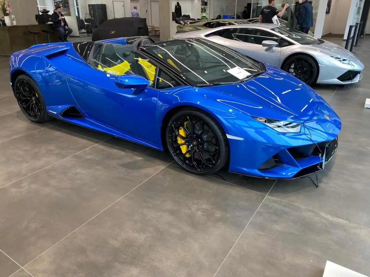 Lamborghini Huracan Evo Spyder 2022, front view — Milan Luxury Cars, Milan. The Lamborghini Huracan Evo Spyder pairs a 640 hp naturally-derived V10 character with an…