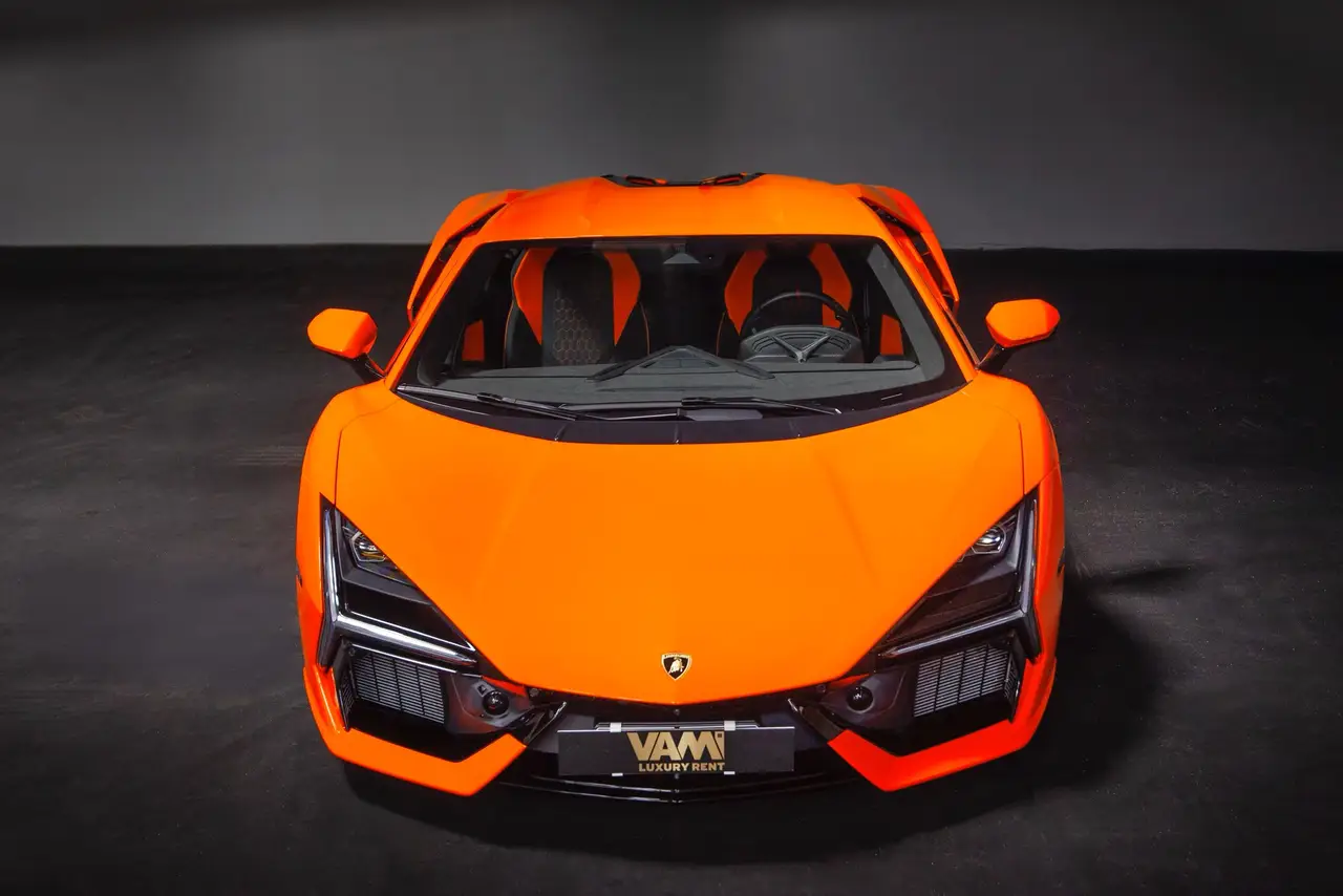 Lamborghini Revuelto 2026, rear view — Milan Luxury Cars, Milan. The Lamborghini Revuelto is Lamborghini's current flagship, a two-seat hybrid V12…