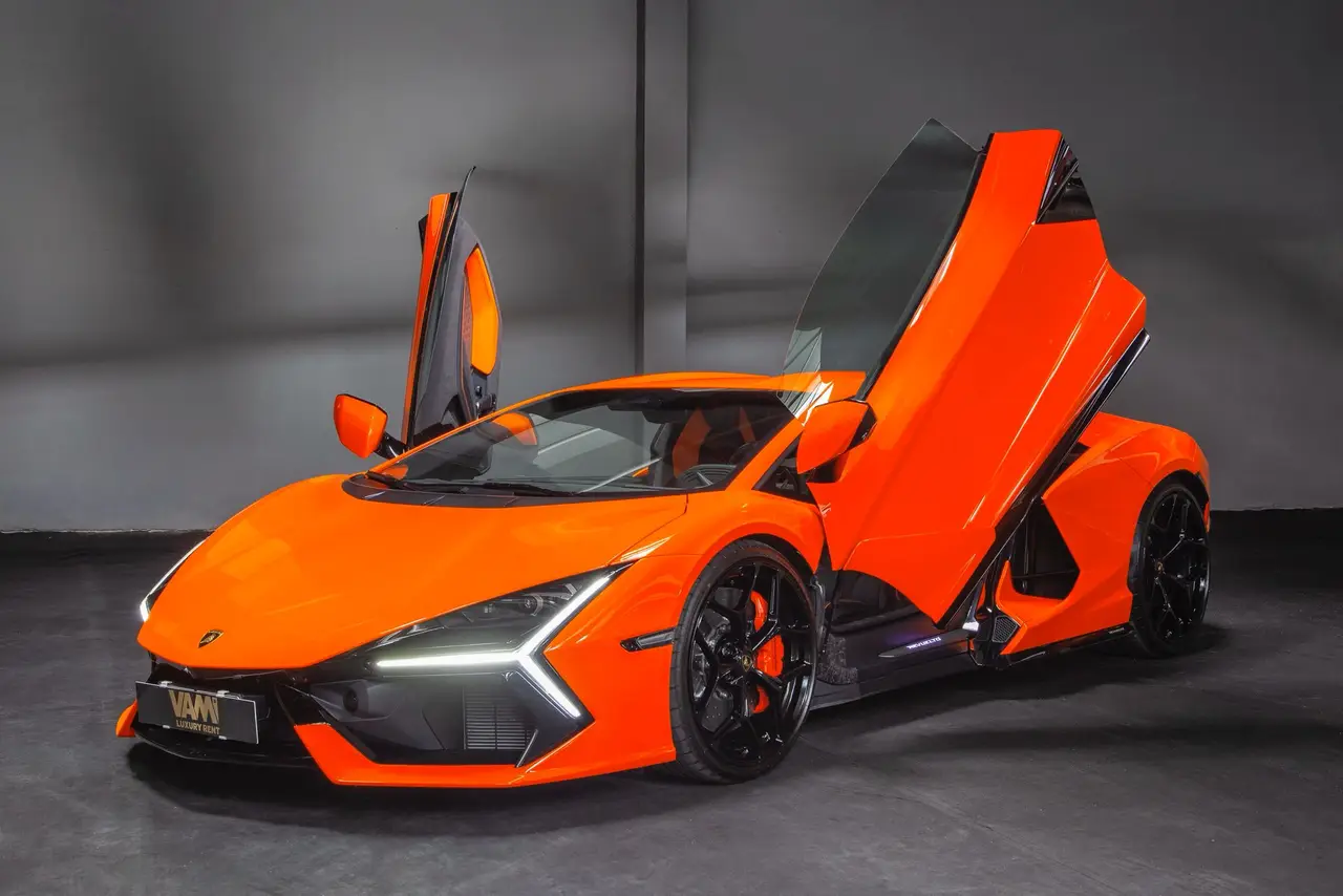 Lamborghini Revuelto 2026, side profile — Milan Luxury Cars, Milan. The Lamborghini Revuelto is Lamborghini's current flagship, a two-seat hybrid V12…