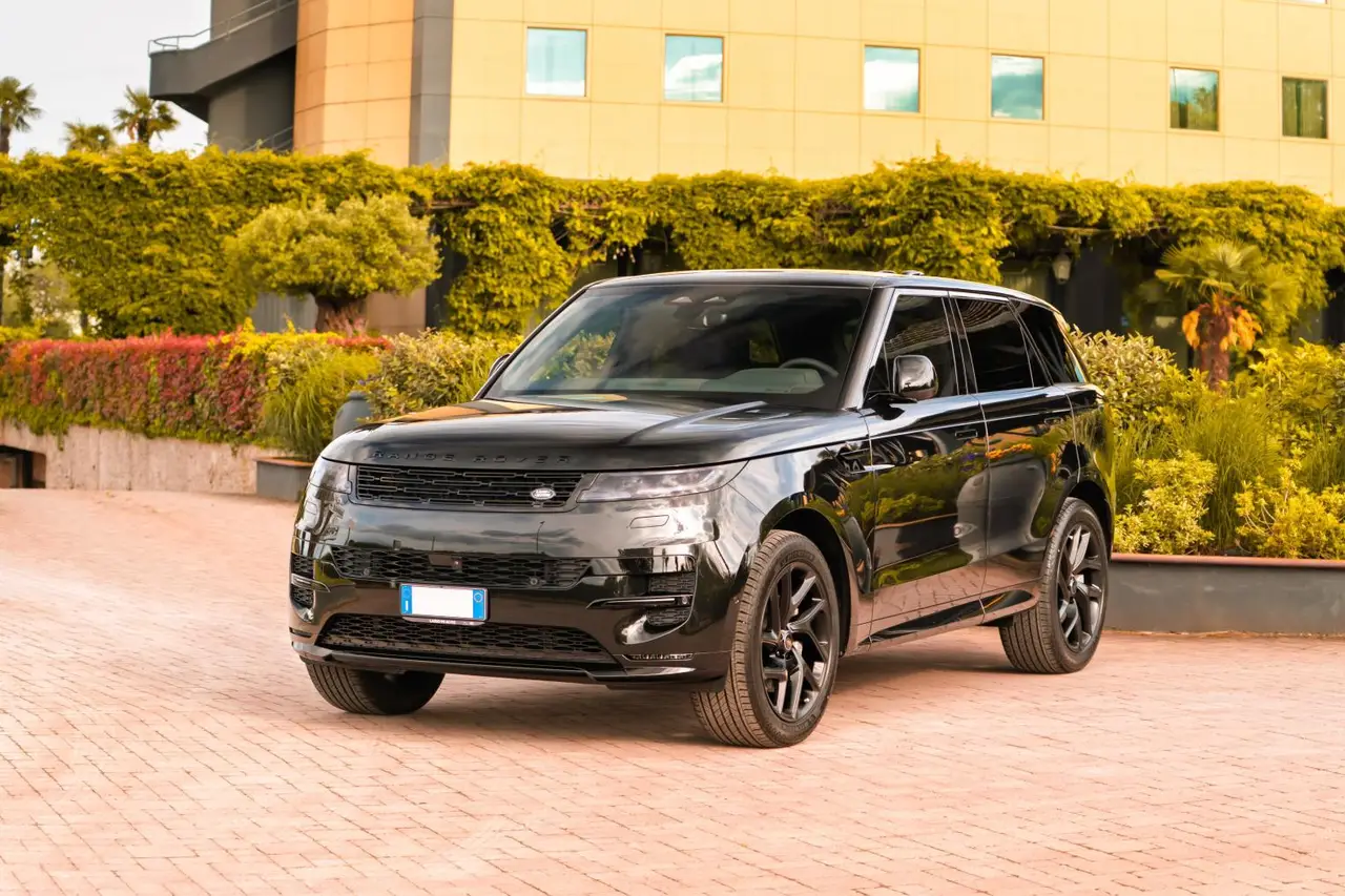 Land Rover Range Rover Sport Dynamic SE 2025, rear view — Milan Luxury Cars, Milan. The 2025 Range Rover Sport Dynamic SE brings 360 hp to a cabin built for five, striking a…