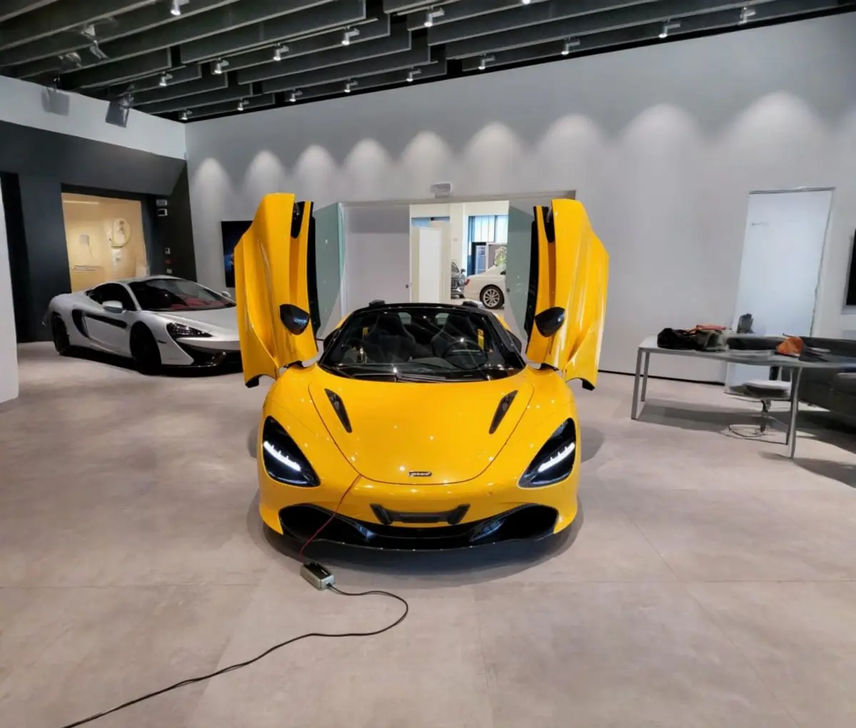 McLaren 720S Spider 2022, exterior — Milan Luxury Cars, Milan. The 2022 McLaren 720S Spider pairs a 720 hp V8 with a folding hard top, giving two…