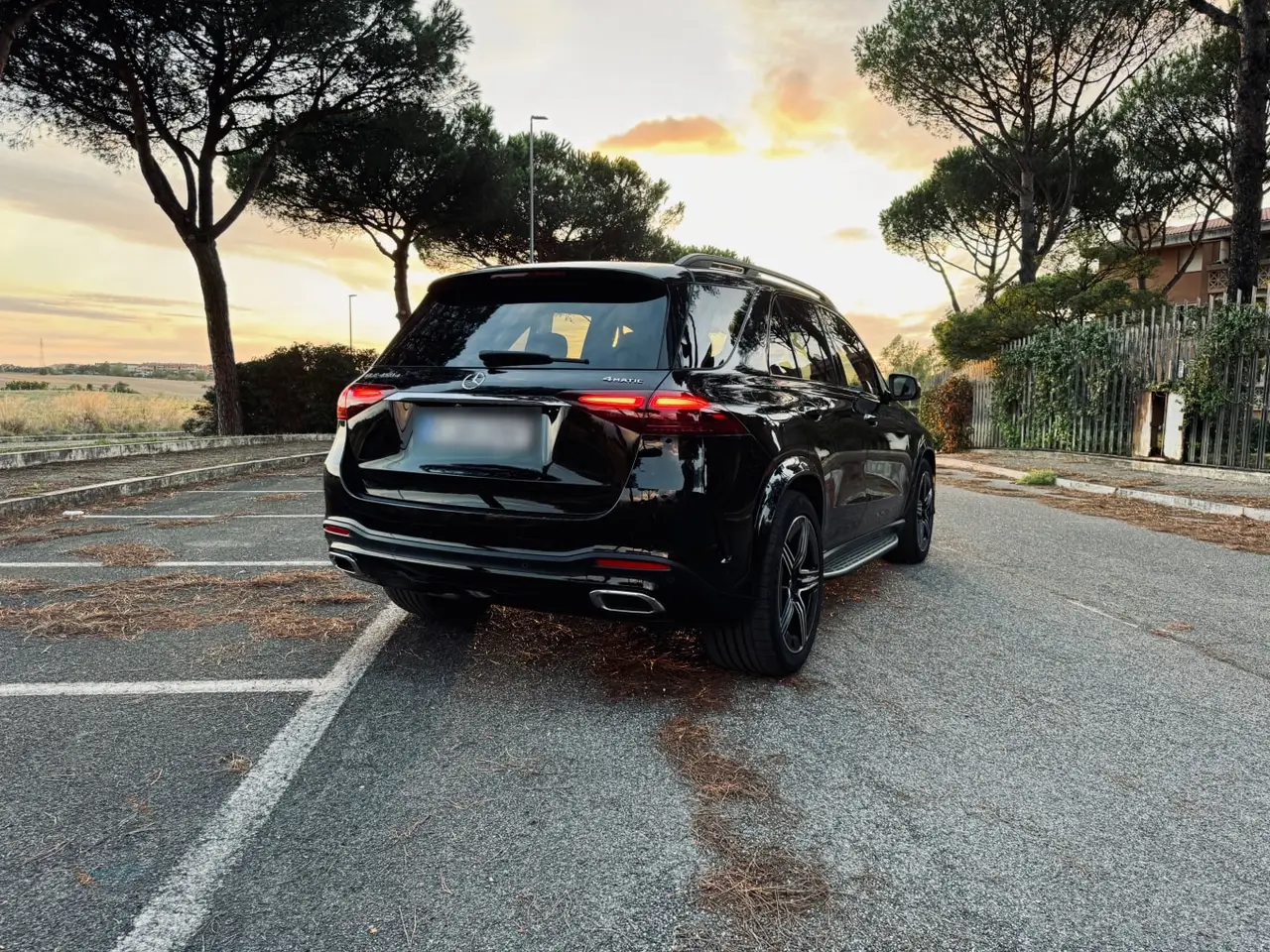 Mercedes Benz GLE 450 AMG 2024, rear view — Milan Luxury Cars, Milan. The Mercedes-Benz GLE 450 AMG pairs a 367 hp six-cylinder drivetrain with the composed,…