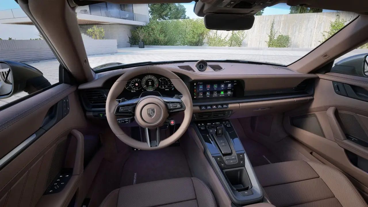 Porsche 911 992 Carrera Turbo S Cabrio 2026, rear view — Milan Luxury Cars, Milan. The 2026 Porsche 911 992 Carrera Turbo S Cabrio pairs 650 hp with the open-top format…