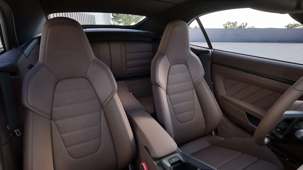 Porsche 911 992 Carrera Turbo S Cabrio 2026, interior — Milan Luxury Cars, Milan. The 2026 Porsche 911 992 Carrera Turbo S Cabrio pairs 650 hp with the open-top format…