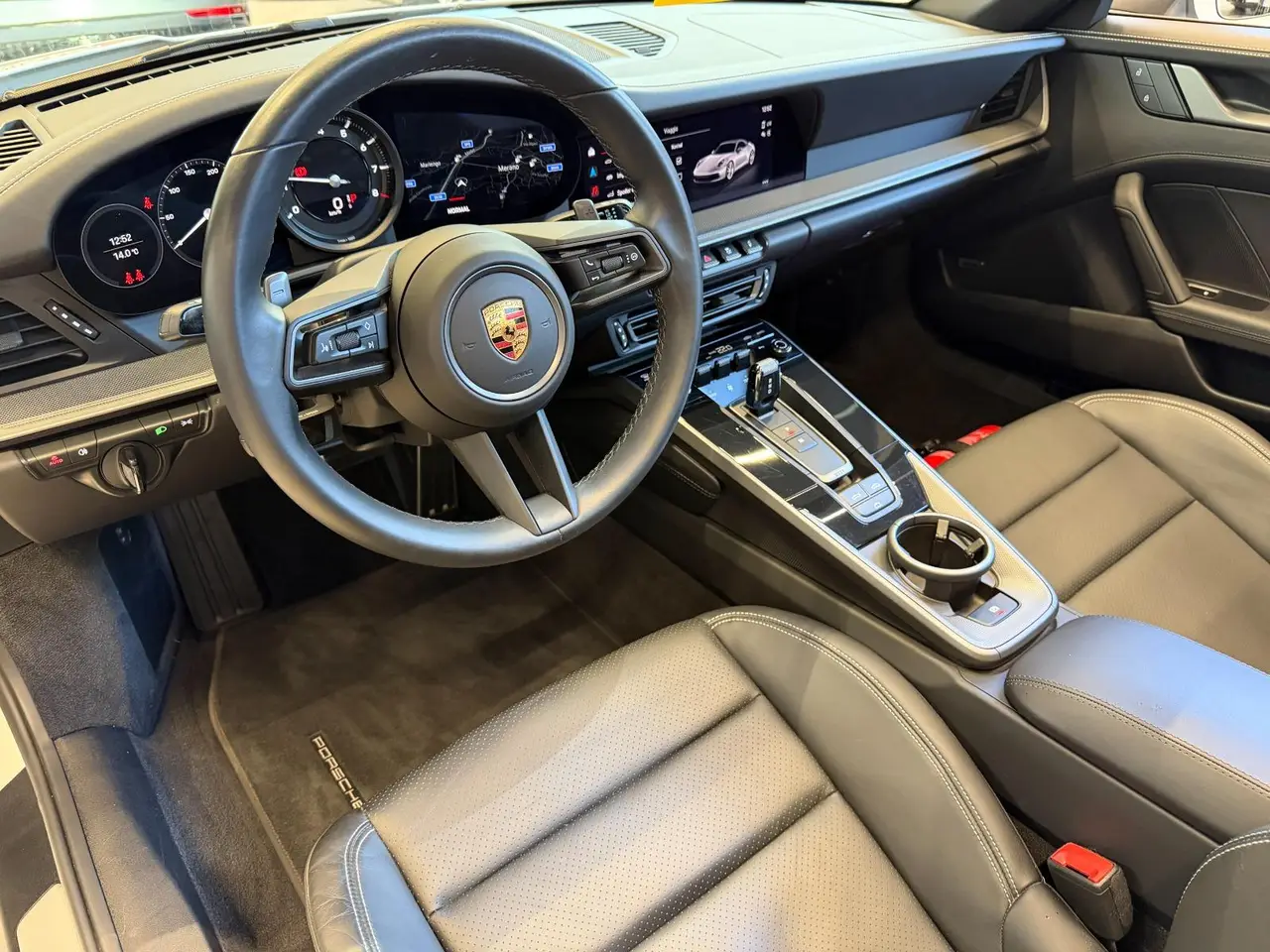 Porsche 911 Carrera S Cabrio (992) 2025, exterior — Milan Luxury Cars, Milan. The 2025 Porsche 911 Carrera S Cabrio (992) pairs a 480 hp flat-six with the everyday…