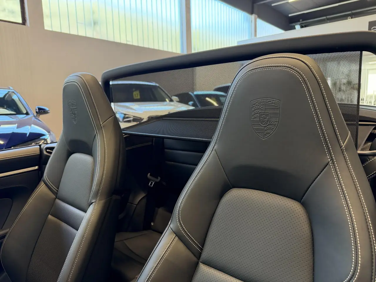 Porsche 911 Carrera S Cabrio (992) 2025, front view — Milan Luxury Cars, Milan. The 2025 Porsche 911 Carrera S Cabrio (992) pairs a 480 hp flat-six with the everyday…