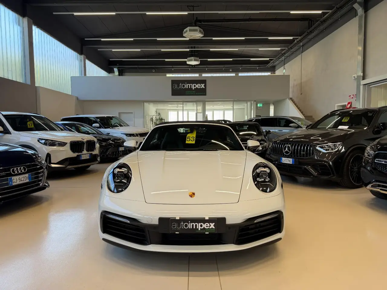Porsche 911 Carrera S Cabrio (992) 2025, interior — Milan Luxury Cars, Milan. The 2025 Porsche 911 Carrera S Cabrio (992) pairs a 480 hp flat-six with the everyday…
