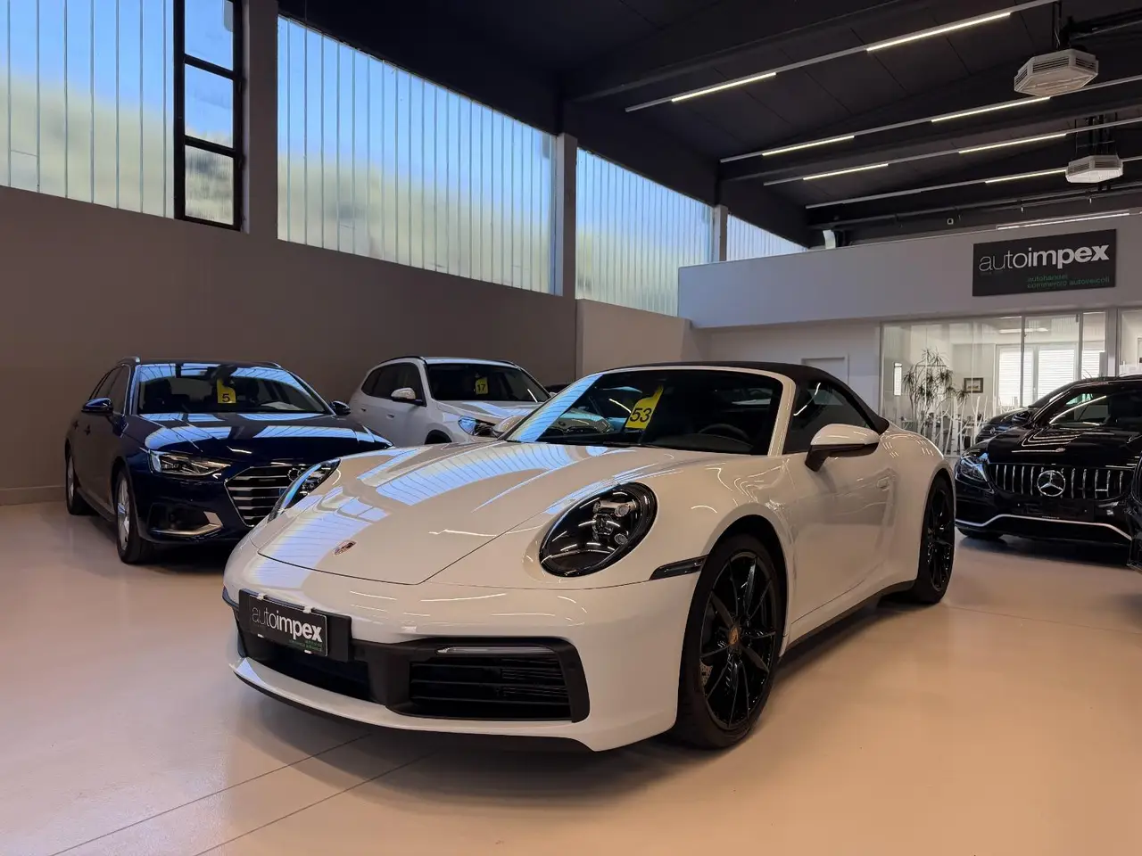 Porsche 911 Carrera S Cabrio (992) 2025, dashboard — Milan Luxury Cars, Milan. The 2025 Porsche 911 Carrera S Cabrio (992) pairs a 480 hp flat-six with the everyday…