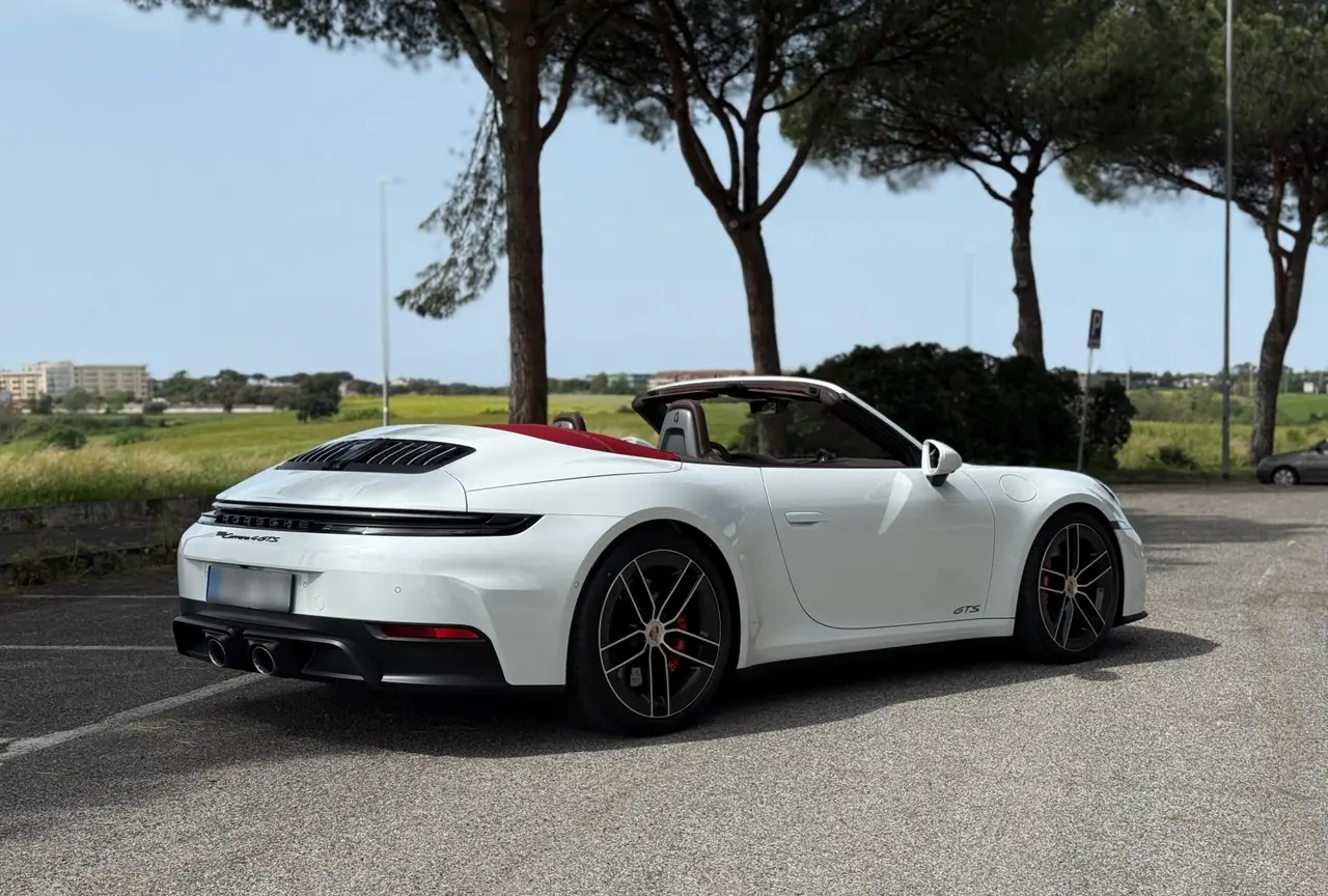 Porsche 992.2 Carrera 4 GTS Cabrio 2025, front view — Milan Luxury Cars, Milan. The 2025 Porsche 992.2 Carrera 4 GTS Cabrio pairs 540 hp with all-wheel drive, a…