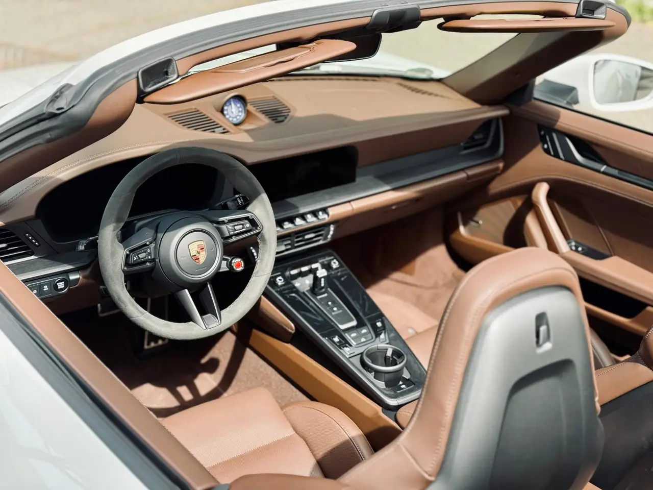 Porsche 992.2 Carrera 4 GTS Cabrio 2025, interior — Milan Luxury Cars, Milan. The 2025 Porsche 992.2 Carrera 4 GTS Cabrio pairs 540 hp with all-wheel drive, a…