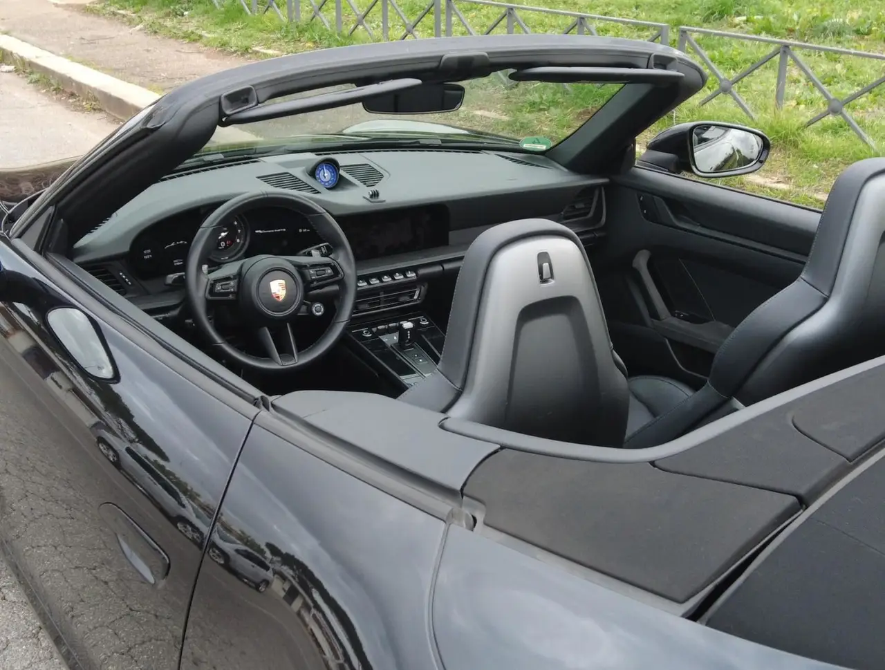 Porsche 992 Carrera 4 GTS Cabrio 2024, interior — Milan Luxury Cars, Milan. The 2024 Porsche 992 Carrera 4 GTS Cabrio pairs 480 hp with all-wheel drive, a…
