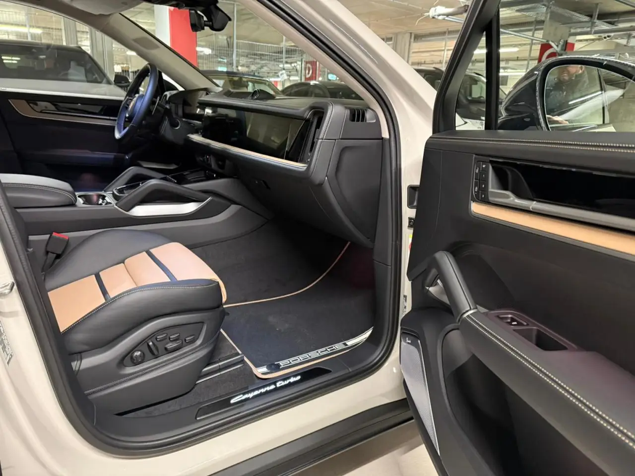 Porsche Cayenne Turbo E-Hybrid Coupé GT 2026, rear view — Milan Luxury Cars, Milan. The 2026 Porsche Cayenne Turbo E-Hybrid Coupé GT pairs a 739 hp hybrid powertrain with…