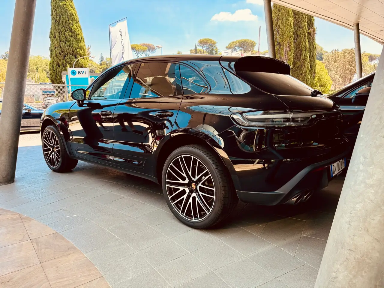Porsche Macan 2024, rear view — Milan Luxury Cars, Milan. The 2024 Porsche Macan pairs a compact SUV footprint with 265 hp, enough for confident…